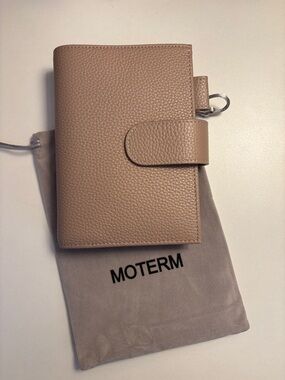 Moterm Pocket Taupe Leather Cover with back pocket & dust bag Like New